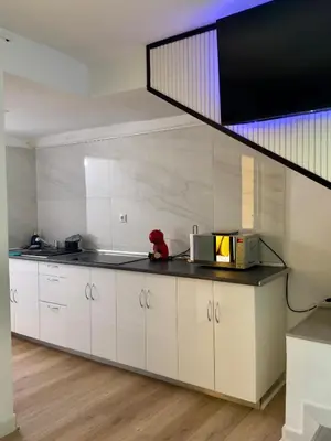 Una cocina o zona de cocina en Duplex Sonemar Pool
