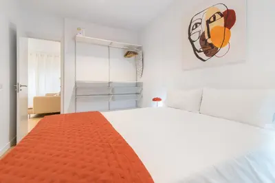 Cama o camas de una habitación en Home2Book Cozy & Chic Apartment near the Beach