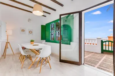 Un balcón o terraza de Home2Book Oceanfront Bliss in Taliarte