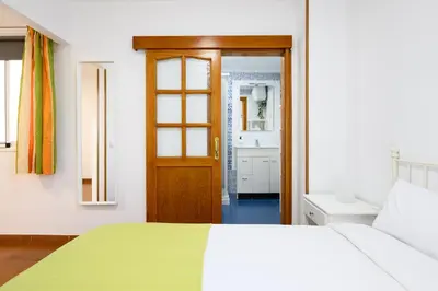 Cama o camas de una habitación en ROSALES BEACH