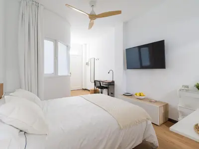 Cama o camas de una habitación en Precioso estudio en Las Canteras