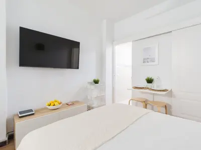 Una televisión o centro de entretenimiento en Precioso estudio en Las Canteras