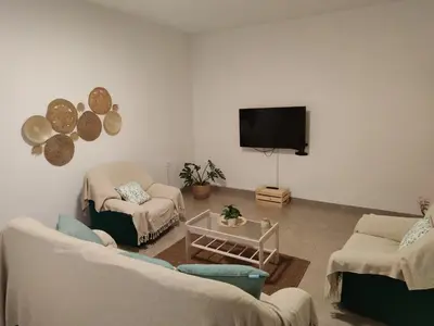 Una televisión o centro de entretenimiento en Finca El Cercadillo