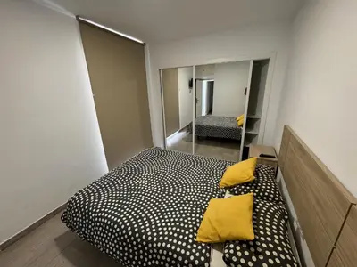 Cama o camas de una habitación en Estupendo apartamento con dos dormitorios