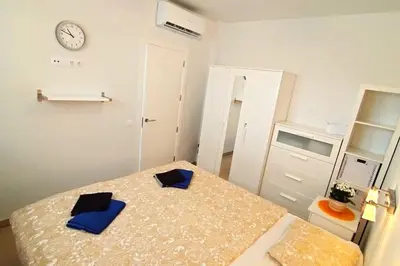 Cama o camas de una habitación en Vista Mar Arguineguín