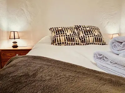 Cama o camas de una habitación en Un Mar Azul que Brilla
