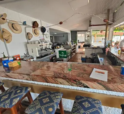 Un restaurante o sitio para comer en San Agustin Ocean View Terrace