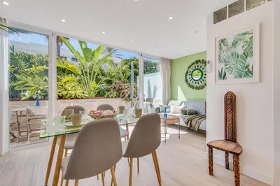 Zona de estar de Home2Book Stylish Tropical Apt Terrace & Pool