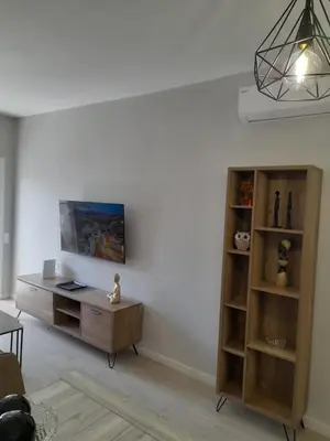 Una televisión o centro de entretenimiento en Casa Lola