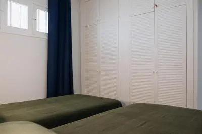Cama o camas de una habitación en Apartamento Sol y Mar