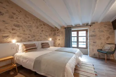 Cama o camas de una habitación en La Casa de San Juan - ARTEMI