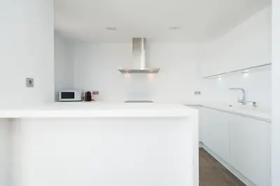 Una cocina o zona de cocina en Altos de la Gloria Beach Apartments