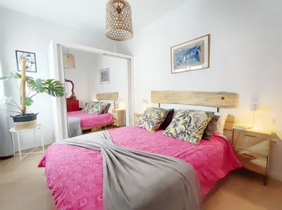 Cama o camas de una habitación en Oasis Beach by Wave Properties