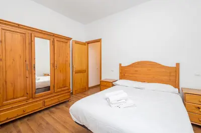 Cama o camas de una habitación en Balcon de la Mina Suites - AirCon and Terrace with views