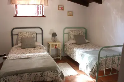 Cama o camas de una habitación en Casa Rural Tintilla