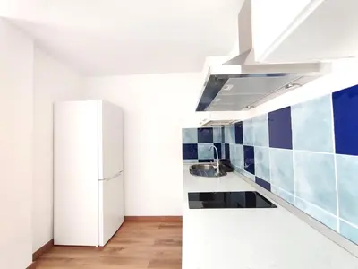 Una cocina o zona de cocina en Pozo Wave Properties