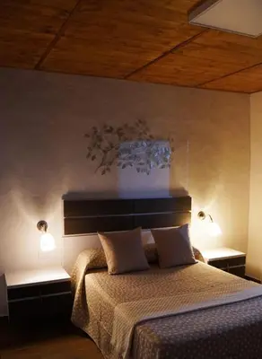 Cama o camas de una habitación en CASA MAMASICA