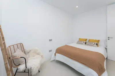 Cama o camas de una habitación en Gold Suite Canteras by Canarias Homelidays