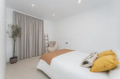 Cama o camas de una habitación en Gold Suite Canteras by Canarias Homelidays