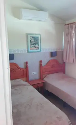 Cama o camas de una habitación en Chalet 2 dormitorios, cerca CC Yumbo