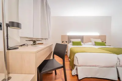 Cama o camas de una habitación en SAHERA HOTEL Boutique
