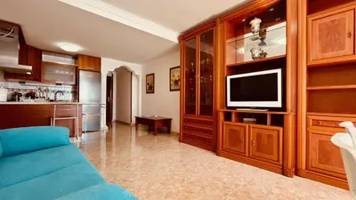 Una televisión o centro de entretenimiento en Click&Guest - Bright Sun House with Sea Views