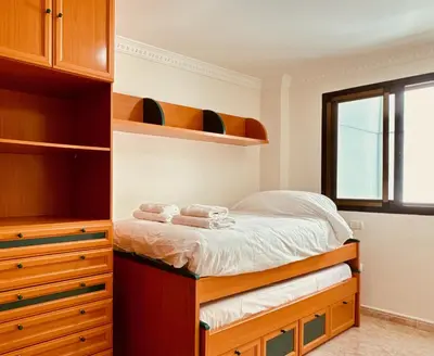 Cama o camas de una habitación en Click&Guest - Bright Sun House with Sea Views