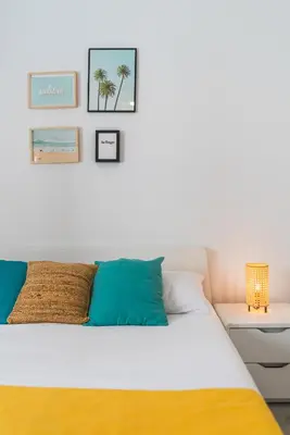 Cama o camas de una habitación en Home2Book Las Canteras Beach House