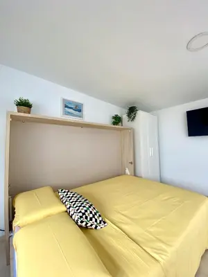 Cama o camas de una habitación en Dorita Estudio
