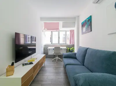Una televisión o centro de entretenimiento en Empire Canteras By CanariasGetaway
