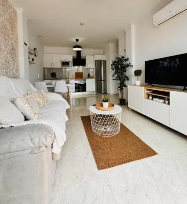 Una televisión o centro de entretenimiento en SANTA CLAUDIA HOLIDAY CLUB SUITE - PUERTO RICO