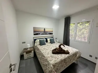 Cama o camas de una habitación en Bungalow the Paradise