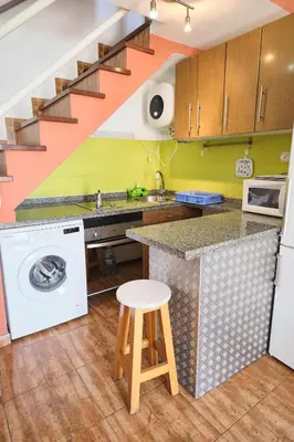 Una cocina o zona de cocina en Delightful Bungalow Playmar: Comfort and Convenience in Maspalomas, Steps Away from Shopping Centers and Beaches