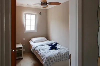 Cama o camas de una habitación en Playa De Mogan Mirador 5 by El Sirocco
