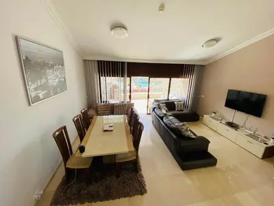 Una televisión o centro de entretenimiento en Amazing Anfi Tauro duplex with private pool
