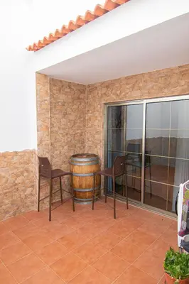 Un balcón o terraza de Villa Florymar a 12 minutos del aeropuerto
