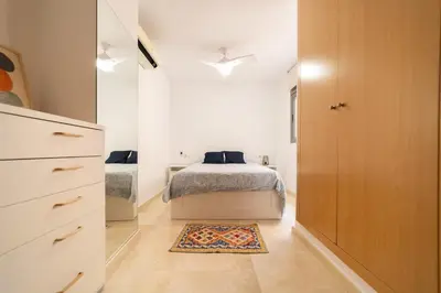 Cama o camas de una habitación en Sand Beach Las Canteras