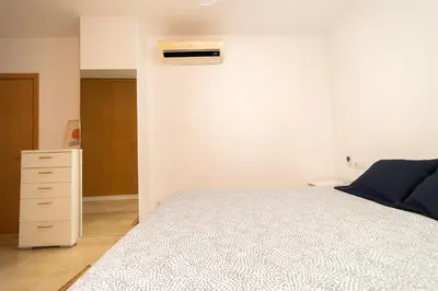 Cama o camas de una habitación en Sand Beach Las Canteras