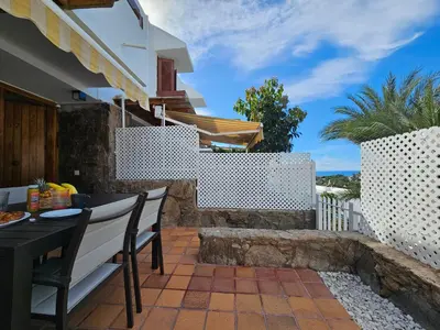 Un balcón o terraza de Comfortable duplex apartment near the beach
