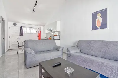 Zona de estar de Bungalow Los Porches D52
