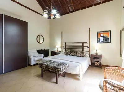 Cama o camas de una habitación en Villa with Pool and sea views in Banana Plantation by CanaryScape
