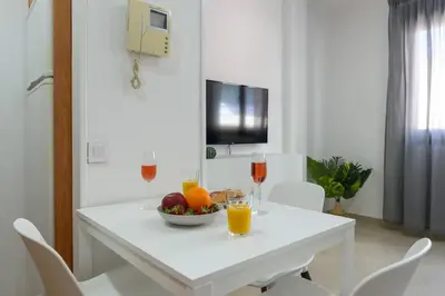 Una televisión o centro de entretenimiento en Private Parking included Dream Gravina Studio