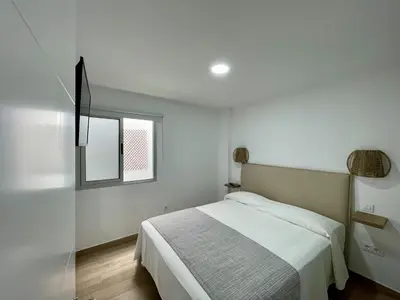 Cama o camas de una habitación en Deluxe Home Las Palmas - by Gestión Vacacional Canarias