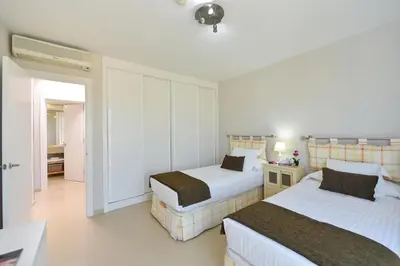 Cama o camas de una habitación en Los Lagos 36 by VillaGranCanaria