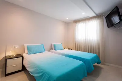 Cama o camas de una habitación en Residencial Begoña, bungalow recién reformado