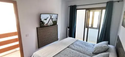 Cama o camas de una habitación en Arinaga Beach Gran Canaria