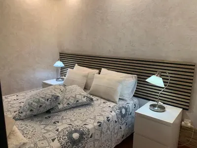 Cama o camas de una habitación en jardin vista mar