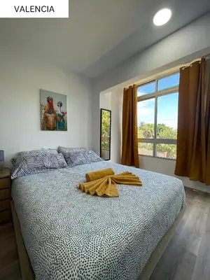 Cama o camas de una habitación en CoLiving El Juanito