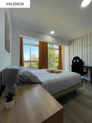 Cama o camas de una habitación en CoLiving El Juanito
