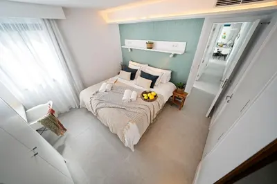 Cama o camas de una habitación en Amapola Coral - recién reformado, frente a la playa